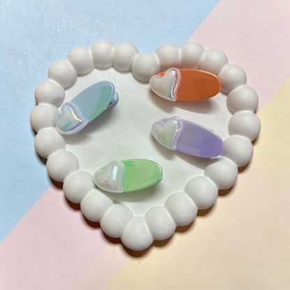 Iridescent heart hair clip set