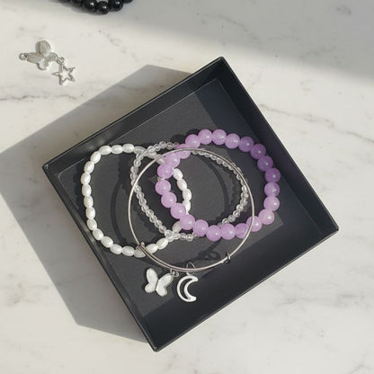 White butterfly bangle and bracelet stack