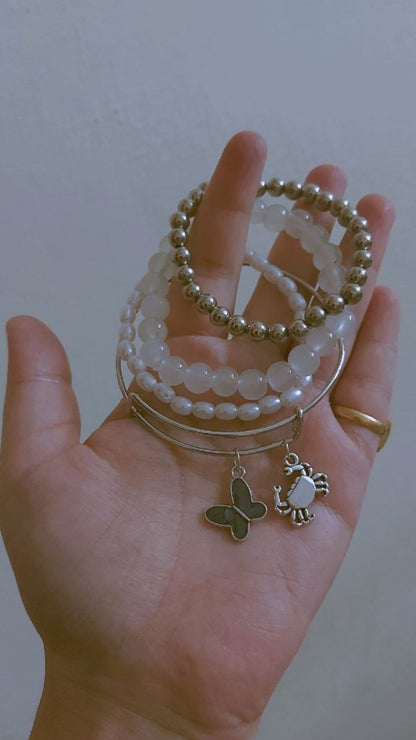Black butterfly bangle and bracelet stack