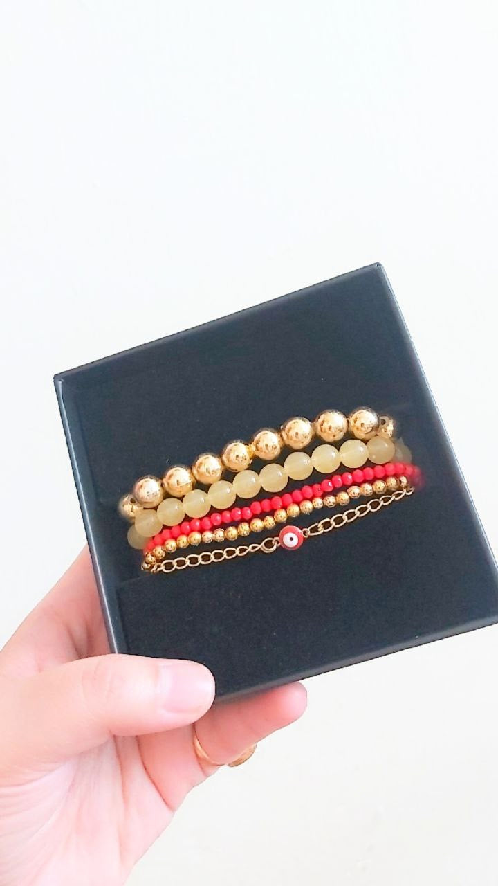 Red bracelet stack